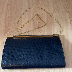 Elegant Black Clutch with Gold Chain